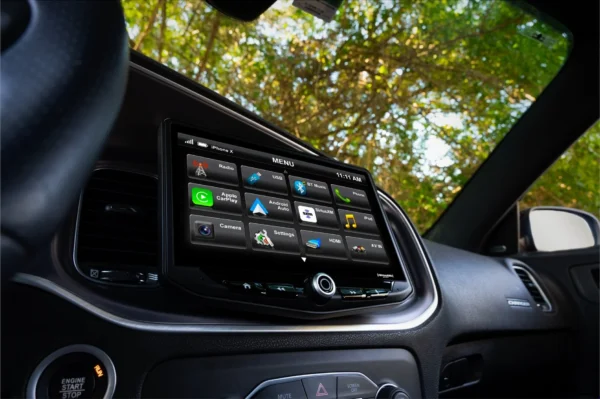 The interior of a car with a Dodge Challenger (2008-2014) & Dodge Charger (2008-2010) HEIGH10 10" Touch Screen Plug-and-Play Radio Kit stereo.