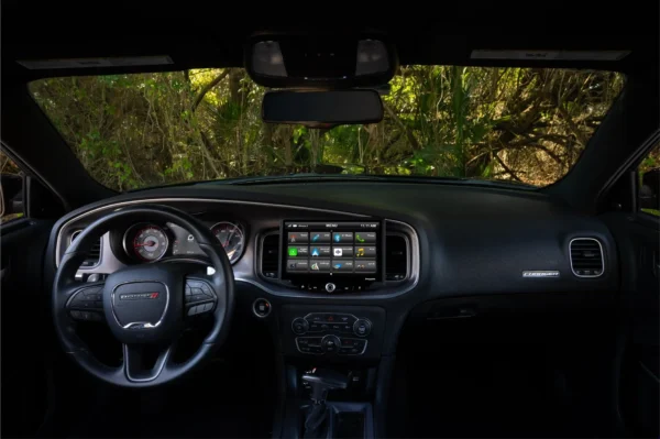 The interior of the Dodge Challenger (2008-2014) & Dodge Charger (2008-2010) HEIGH10 10" Touch Screen Plug-and-Play Radio Kit.