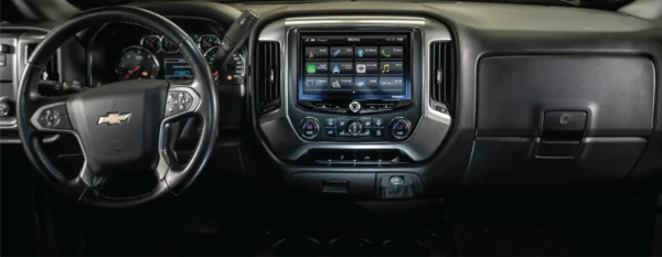 The dashboard of a Chevy Silverado and GMC Sierra (2014-2018) HEIGH10 10" Touch Screen Radio Plug-and-Play Kit.