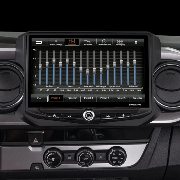 The dashboard of a car with a Toyota Tacoma (2016-2021) HEIGH10 10" Touch Screen Radio Plug-and-Play Kit.